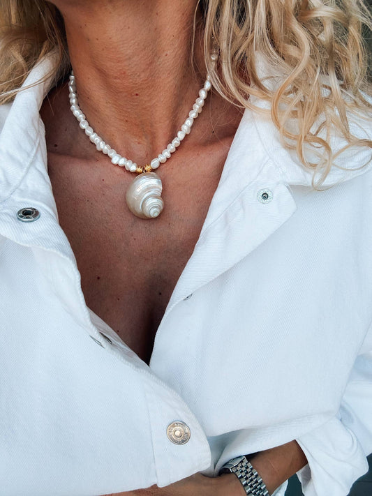 White pearl choker with white large shell charm