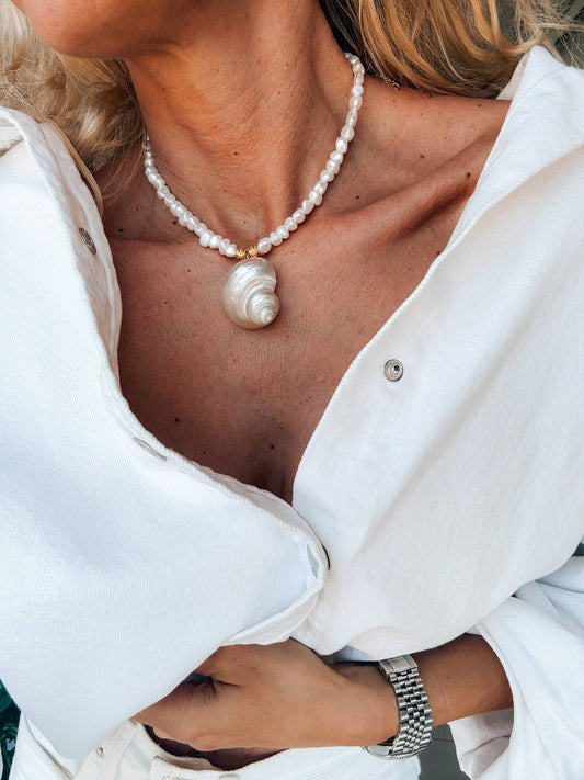 White pearl choker with white large shell charm