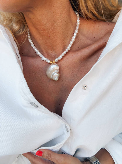 White pearl choker with white large shell charm