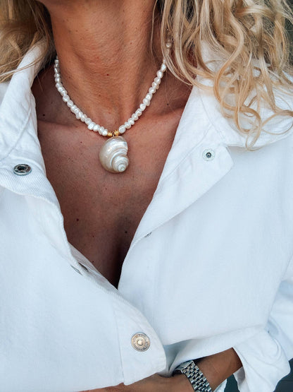 White pearl choker with white large shell charm