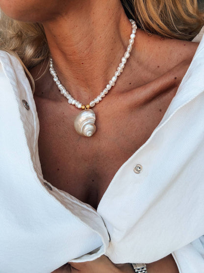 White pearl choker with white large shell charm
