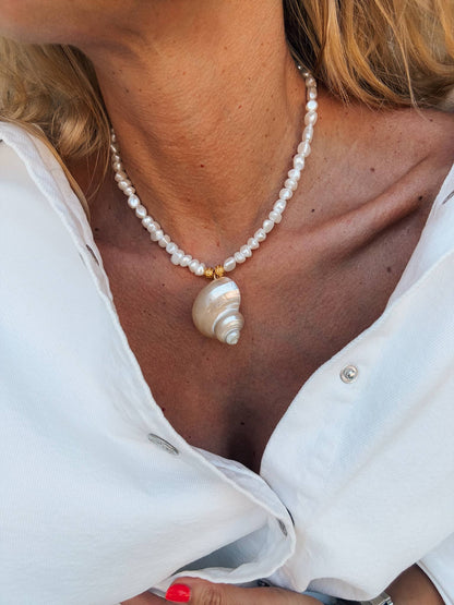 White pearl choker with white large shell charm